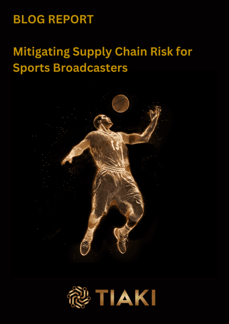 A man is playing basketball in the dark.