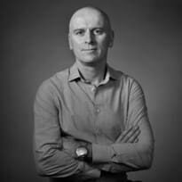 A man with his arms crossed in front of him.